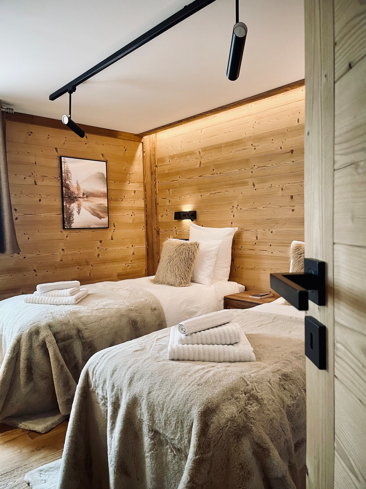 La chambre avec deux lits simples